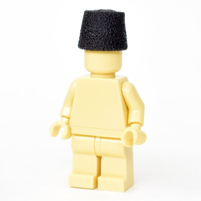 A tall black papakha hat for Lego figures. ( by G-brick Design)