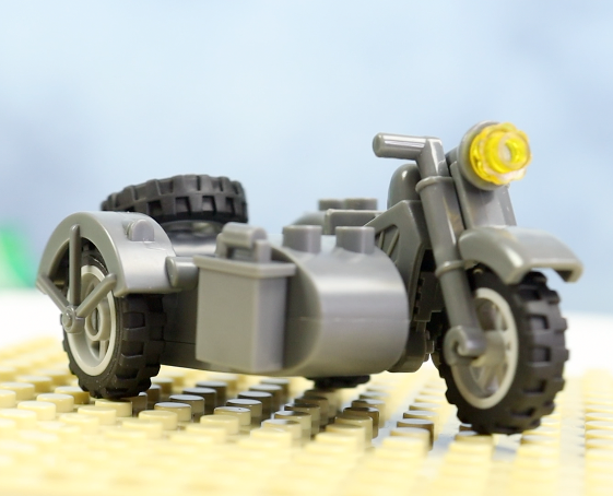 World War II era motorcycle with sidecar.