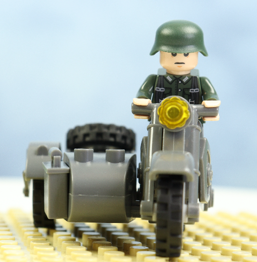 World War II era motorcycle with sidecar.